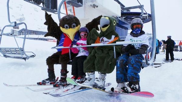 Spike and Shred take Alicia Webster (9) and Reuben Thompson (12) from the Remarkables Primary School up Alta Chair.